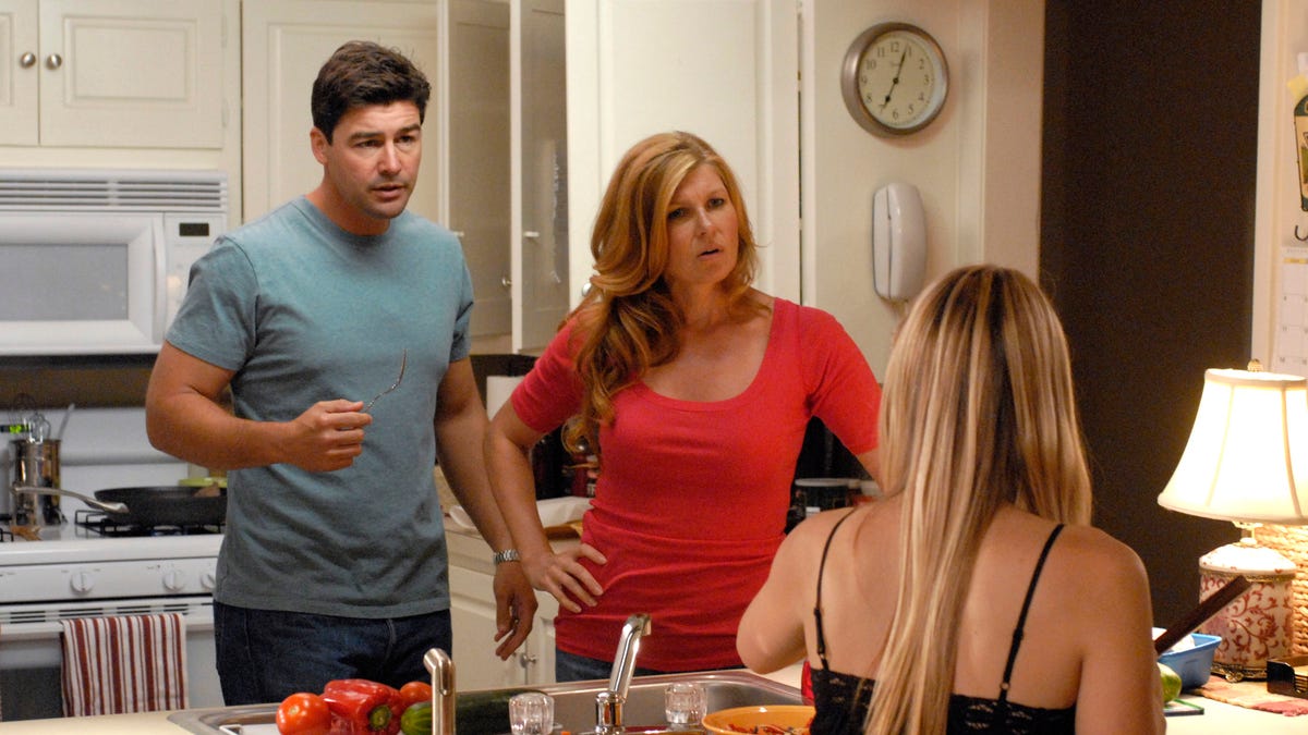 Kyle Chandler as Eric Taylor (L), Connie Britton as Tami Taylor (center), Aimee Teegarden as Julie Taylor (R) from the popular NBC drama series 'Friday Night Lights.' 