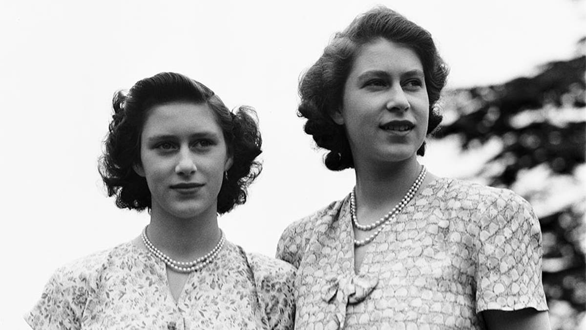 Princess Elizabeth and her sister Princess Margaret (1930 - 2002) at the Royal Lodge, Windsor, UK, 8th July 1946.