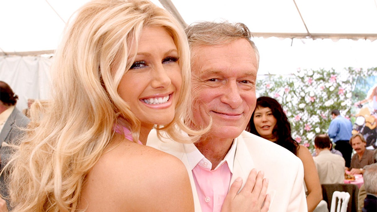 Playmate Of The Year, Brande Roderick poses with Hugh Hefner at the Playmate Of The Year Party April 26, 2001, in Los Angeles, CA.