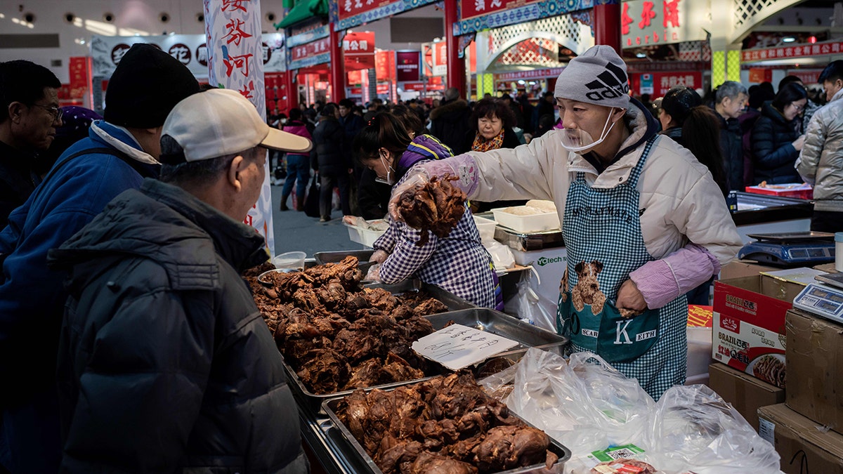 Wet Market' In China Is Linked To Coronavirus Outbreak. What Are These  Markets Like? : Goats and Soda : NPR