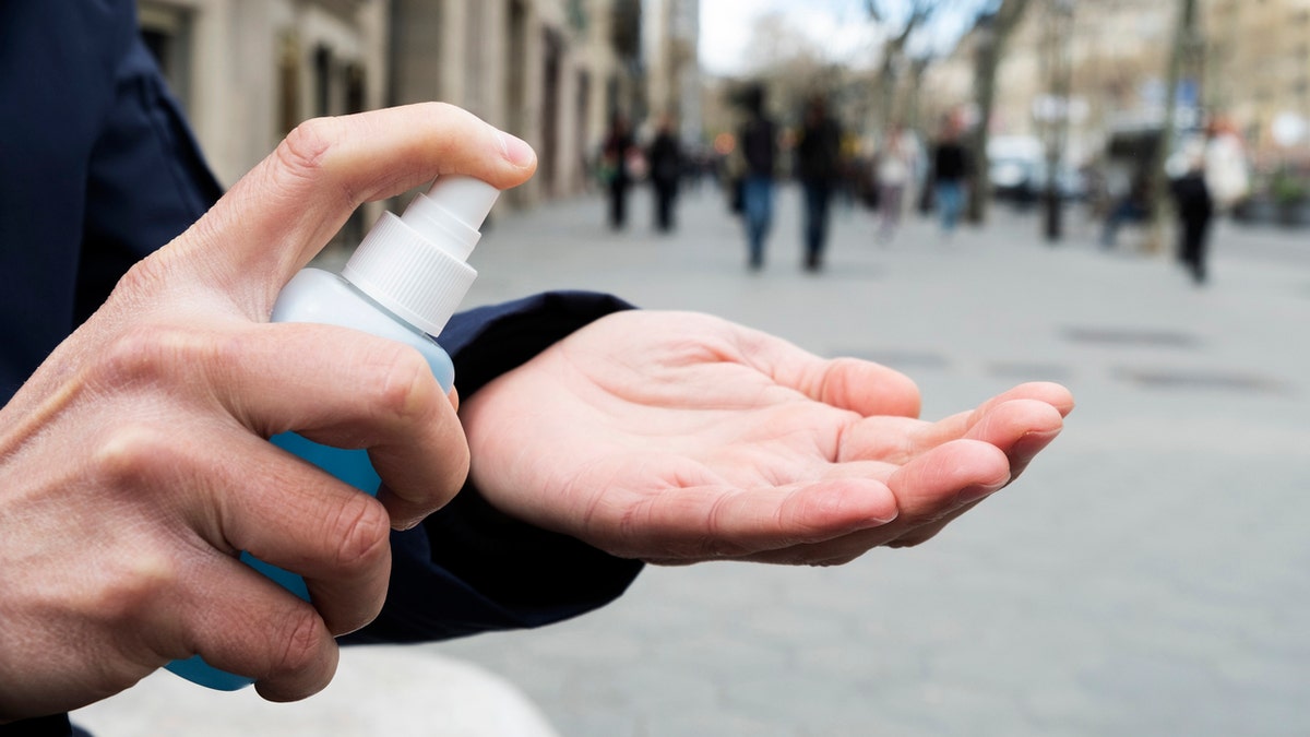 Maintaining a “good social distance," (keeping 6 feet away from others while in public), as well as washing hands often and “routinely” cleaning and disinfecting high-touch surfaces are still listed as key precautions. (Getty Images)