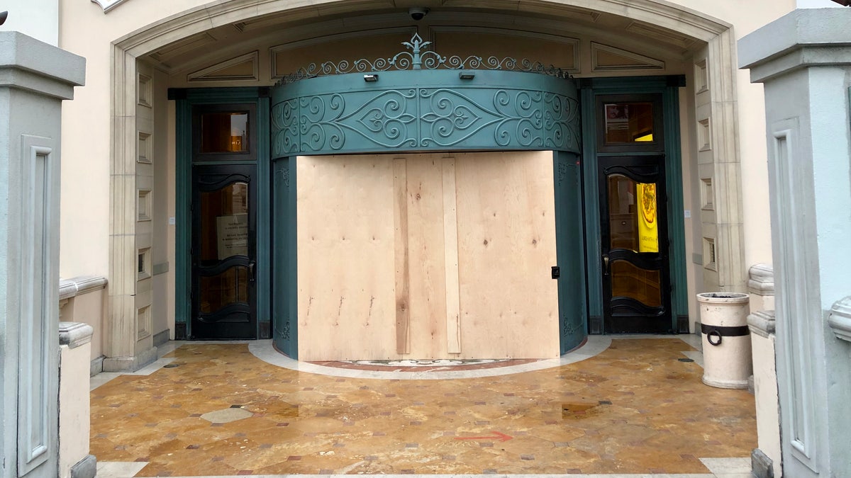 An entrance to the Bellagio is boarded up.
