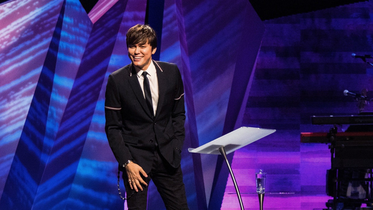 Joseph Prince, pastor of New Creation Church in Singapore, speaks to his 33,000 member congregation.