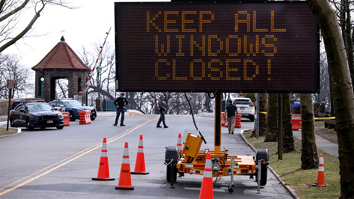 Police guard area where New York State's first drive through coronavirus mobile testing center opened in New Rochelle, New York, U.S., March 13, 2020. REUTERS/Mike Segar - RC26JF9HQ913