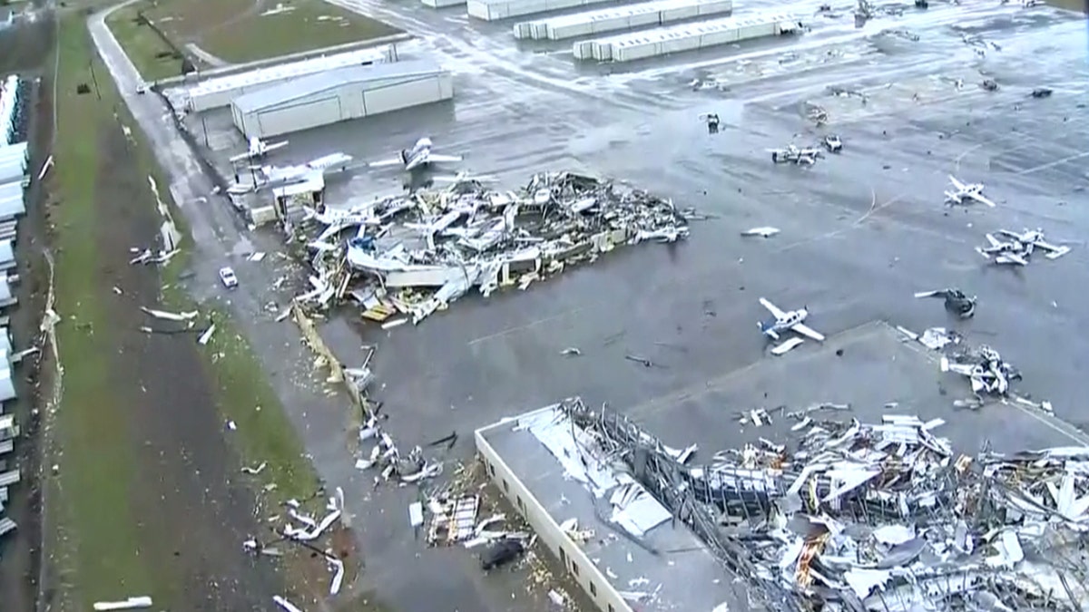 Damaged aircraft can be seen at John C. Tune Airport, Nashville International's sister airport in West Nashville, which “sustained significant damage due to severe weather."