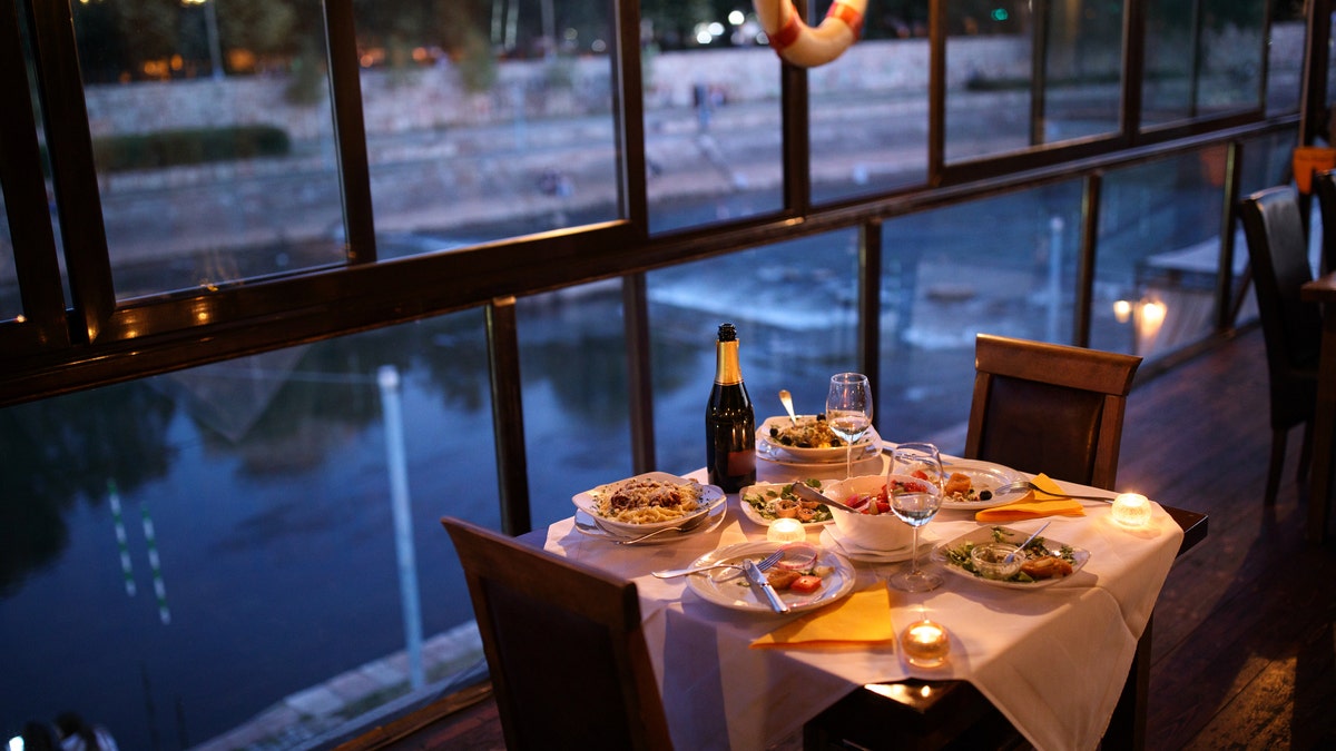 More than a dozen states had enacted bans on in-person dining at restaurants and bars as of Monday afternoon.