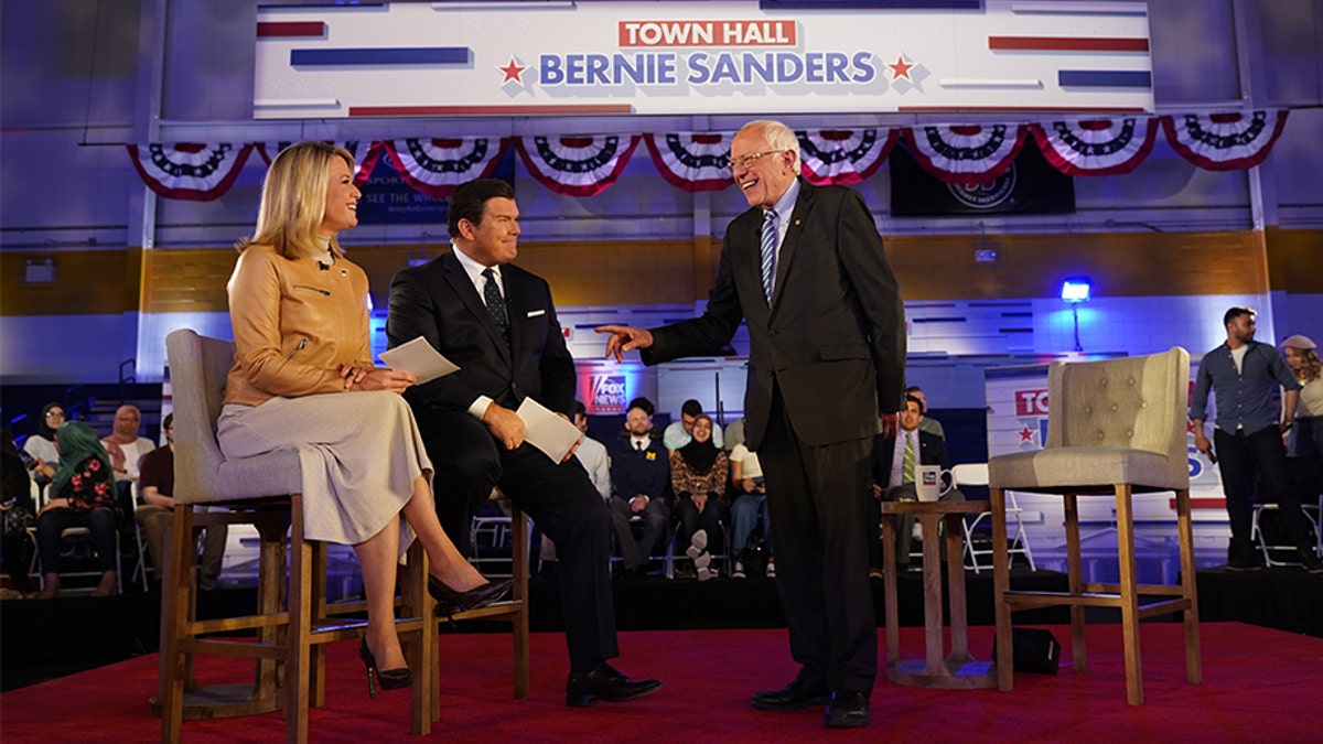 Sanders with Fox News anchors Bret Baier and Martha McCallum at a town hall in Detroit ahead of Tuesday's Democratic primary voting there and in five other states this week.