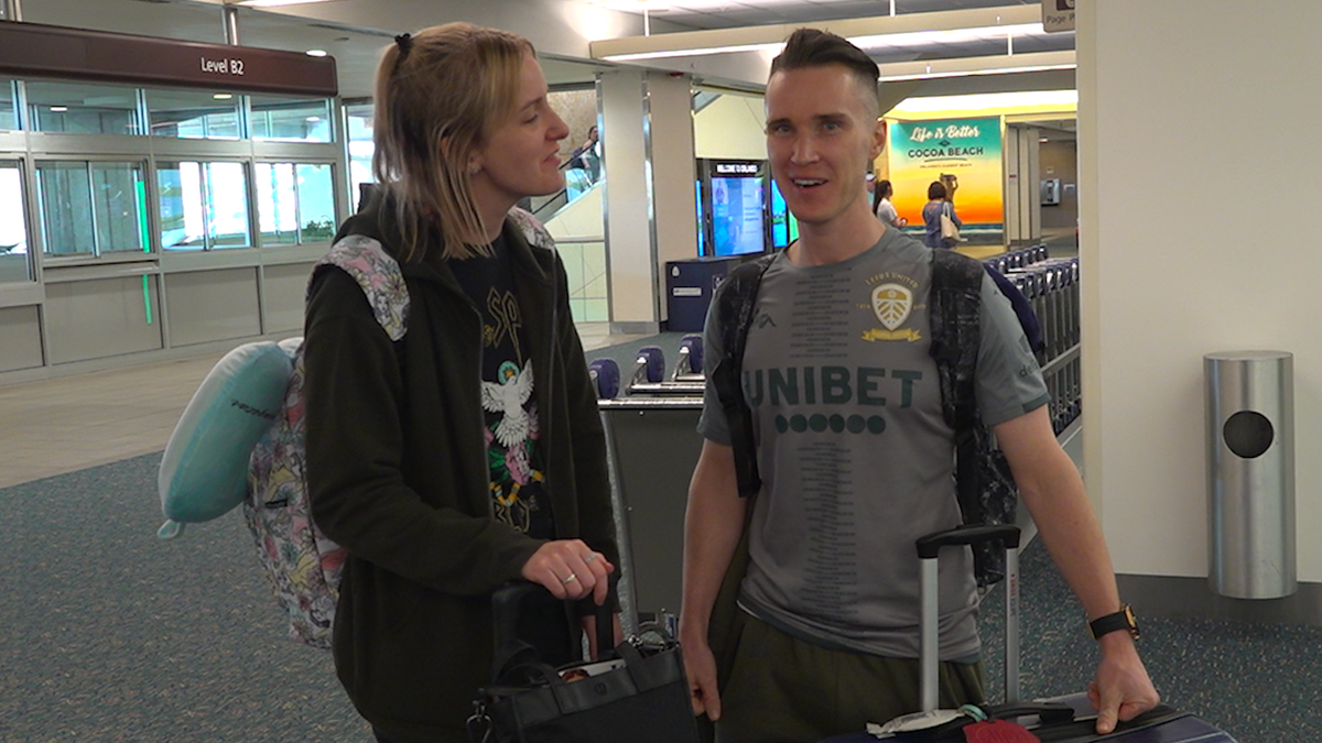 Jack Howarth (right) and his wife, Lucy, arrive at Orlando International Airport for their two-year wedding anniversary (Robert Sherman, Fox News)