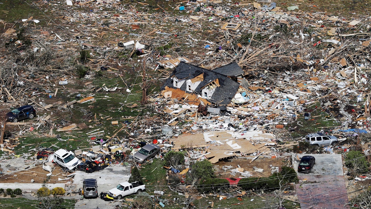 The remains of homes shattered by storms are scattered near Cookeville, Tenn., Tuesday, March 3, 2020.