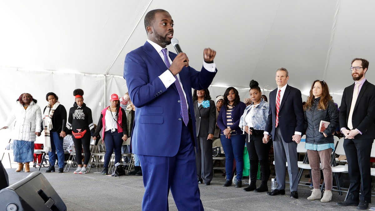 Pastor Jacques Boyd speaks to worshippers during a service in a tent at Mount Bethel Missionary Baptist Church, Sunday, March 8, 2020, in Nashville, Tenn. The congregation held their Sunday service in a tent in the parking lot near the church facilities, which were heavily damaged by a tornado March 3. (AP Photo/Mark Humphrey)