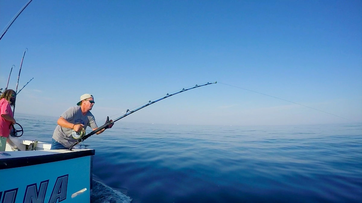 Captain Dave Marciano, Deckhand Angelica Marciano, and First Mate Joe Marciano aboard the Hot Tuna.