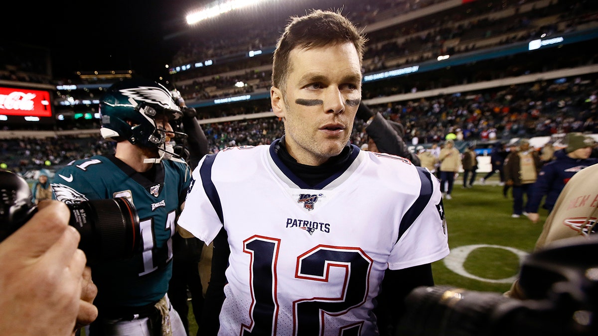 Tom Brady, then with the New England Patriots, walks the field after an NFL football game against the Philadelphia Eagles, Nov. 17, 2019, in Philadelphia. (Associated Press)