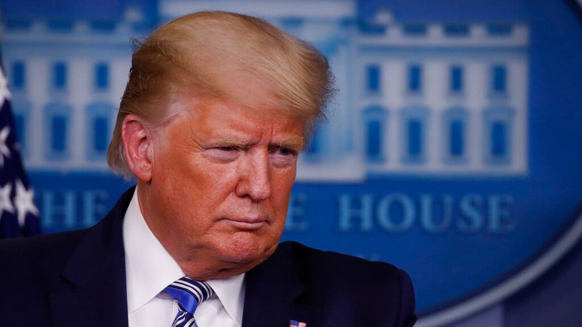 President Donald Trump listens during a briefing about the coronavirus in the James Brady Briefing Room, Monday, March 23, 2020, in Washington. (AP Photo/Alex Brandon)