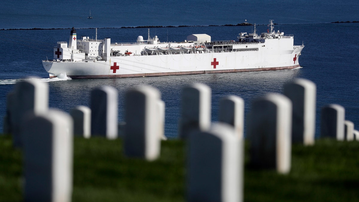 The USNS Mercy hospital ship leaves port Monday, in San Diego.
