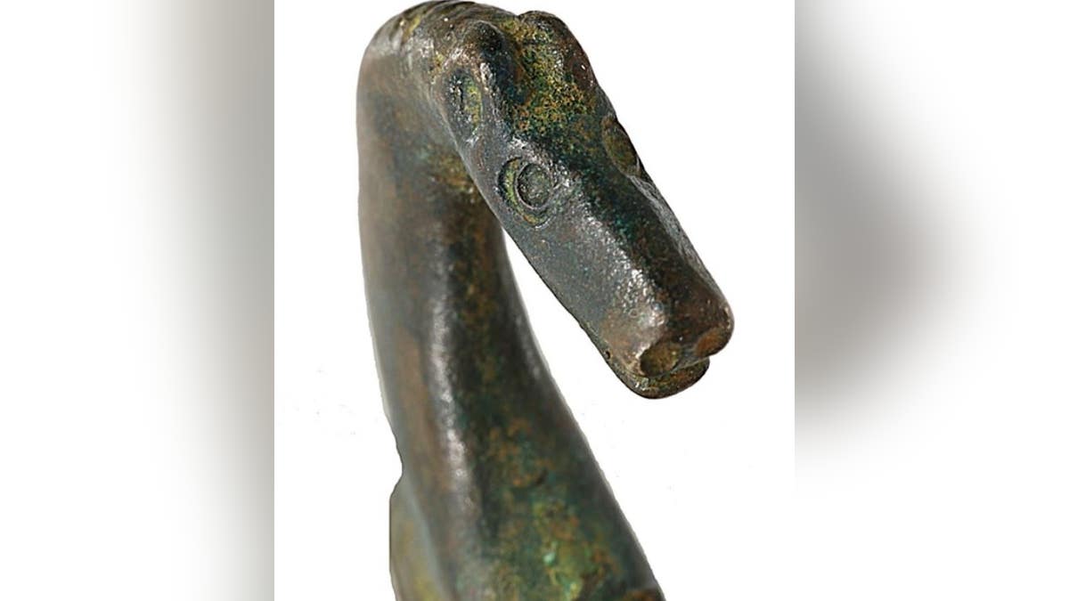 The tiny brooch is only two inches long and will be put on display at a museum in London.