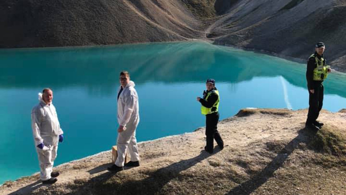 The "Blue Lagoon" is in a former quarry, and draws people who stop and take photos.