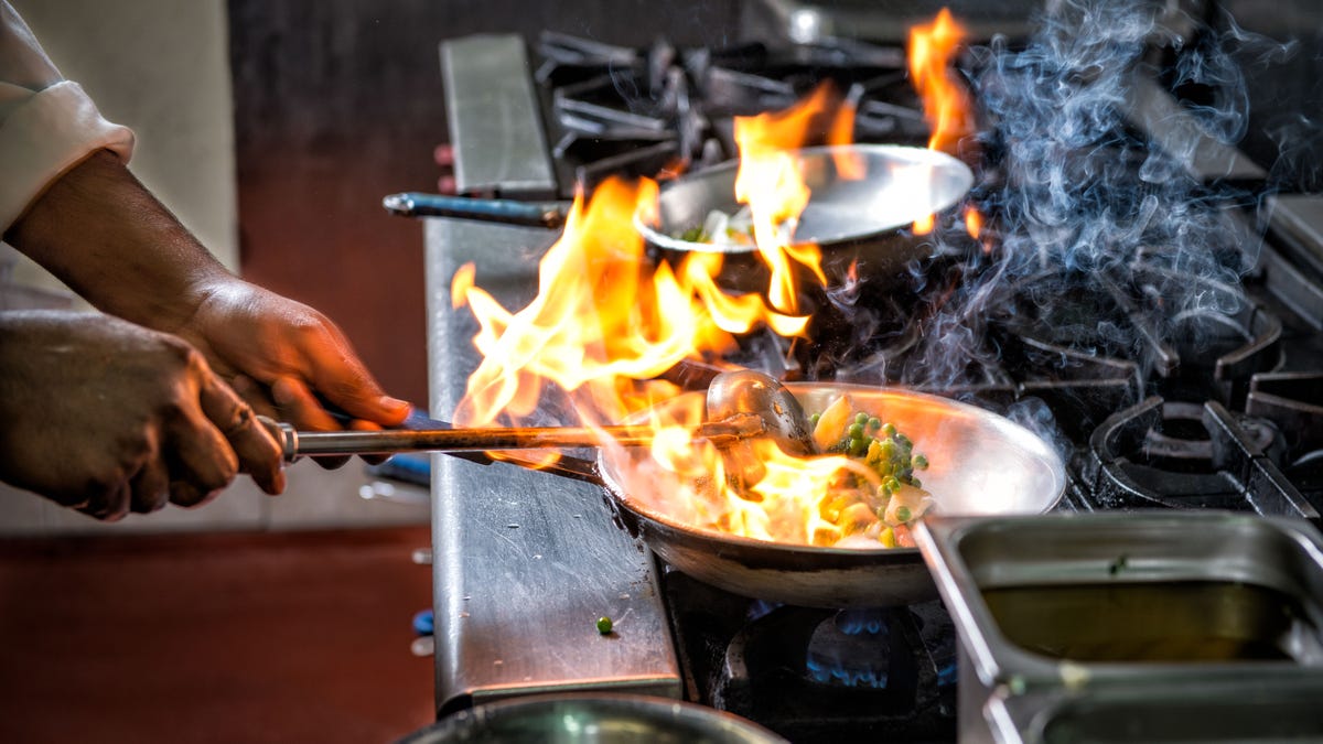 Flambe flame food frying pan