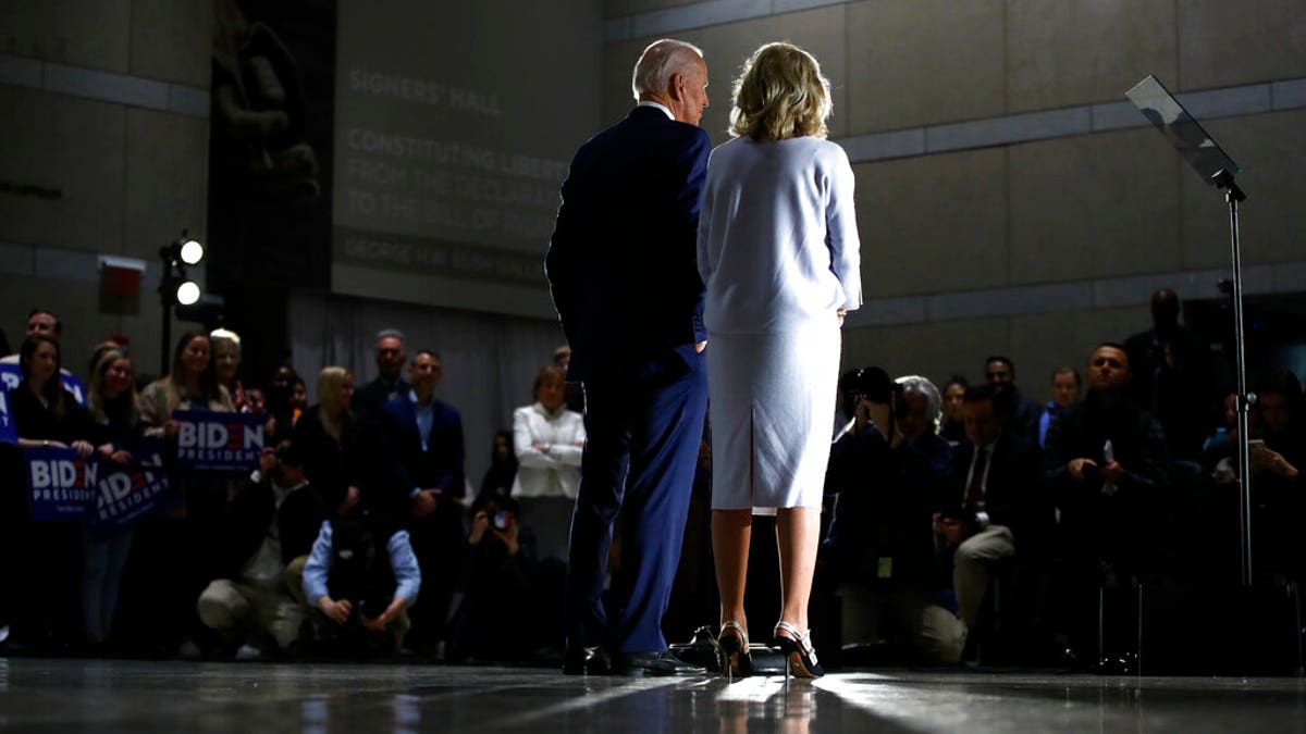 Democratic presidential candidate former Vice President Joe Biden, accompanied by his wife Jill, speaks to members of the press at the National Constitution Center in Philadelphia, Tuesday, March 10, 2020. (AP Photo/Matt Rourke)