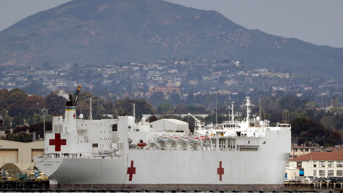 The USNS Mercy, a Navy hospital ship, is seen docked at Naval Base San Diego Wednesday, March 18, 2020, in San Diego. (Associated Press)