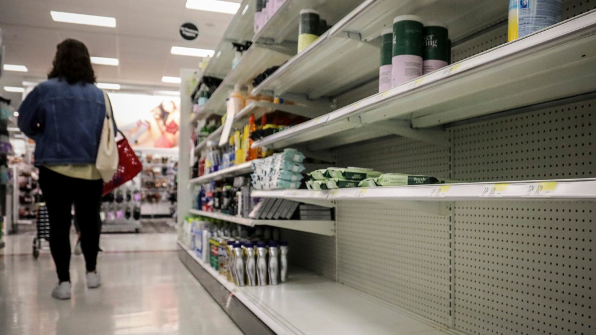 Empty shelves for disinfectant wipes wait for restocking, as concerns grow around COVID-19, Tuesday March 3, 2020, in New York. 