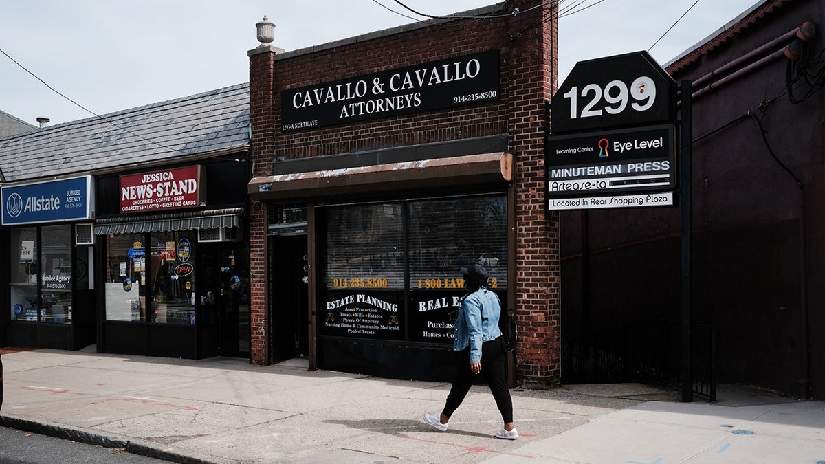 Empty streets, restaurants and cafes make up the business area in the one-mile containment zone on March 11, 2020 in New Rochelle, New York. New Rochelle, a city just north of New York City, has become the state's largest source of COVID-19 infections, prompting Governor Andrew Cuomo to announce Tuesday that officials will be implementing a one mile radius “containment area” there to try to halt the spread of Coronavirus.