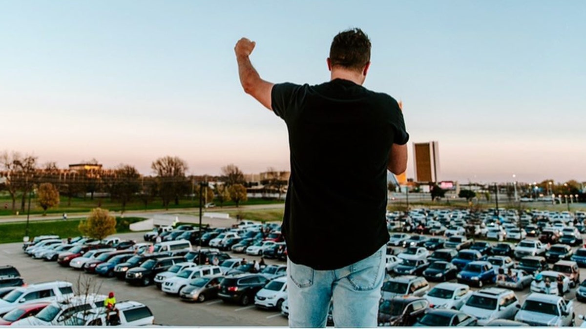 Paul Daugherty, the lead pastor of Victory Church in Tulsa, preaches during a drive-in service amid the coronavirus outbreak.