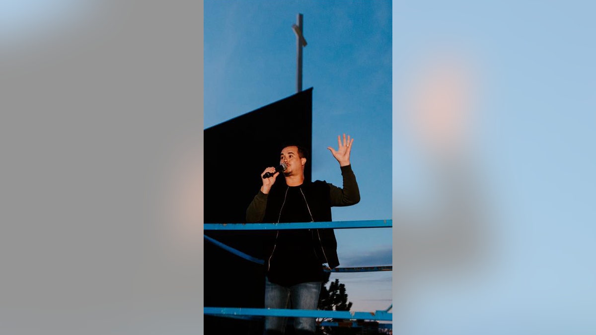 Paul Daugherty, the lead pastor of Victory Church in Tulsa, preaches during a drive-in service amid the coronavirus outbreak.