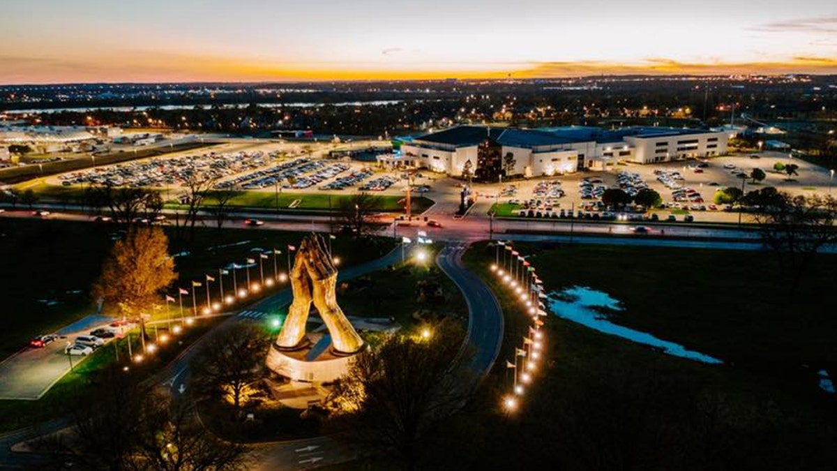 Victory Church in Tulsa is lit up for a drive-in nighttime service amid the coronavirus.