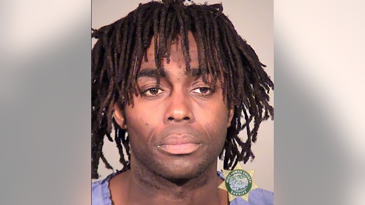 Christopher James, 40, was charged with first-degree robbery and booked into the Multnomah County Detention Center. (Portland Police Bureau)