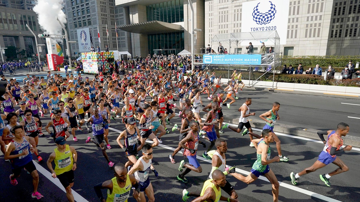 Elite runners start the Tokyo Marathon in Tokyo, Sunday, March 1, 2020. The race was scaled back as part of Japan's efforts to combat the spread of the coronavirus.