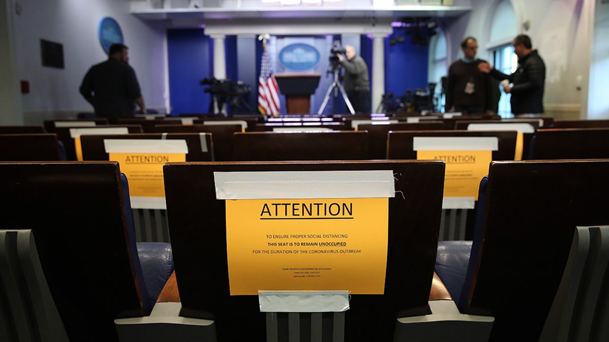 WASHINGTON, DC - MARCH 16: Seats in the White House press briefing room are marked with warnings to maintain social distancing March 16, 2020 in Washington, DC. (Photo by Win McNamee/Getty Images)