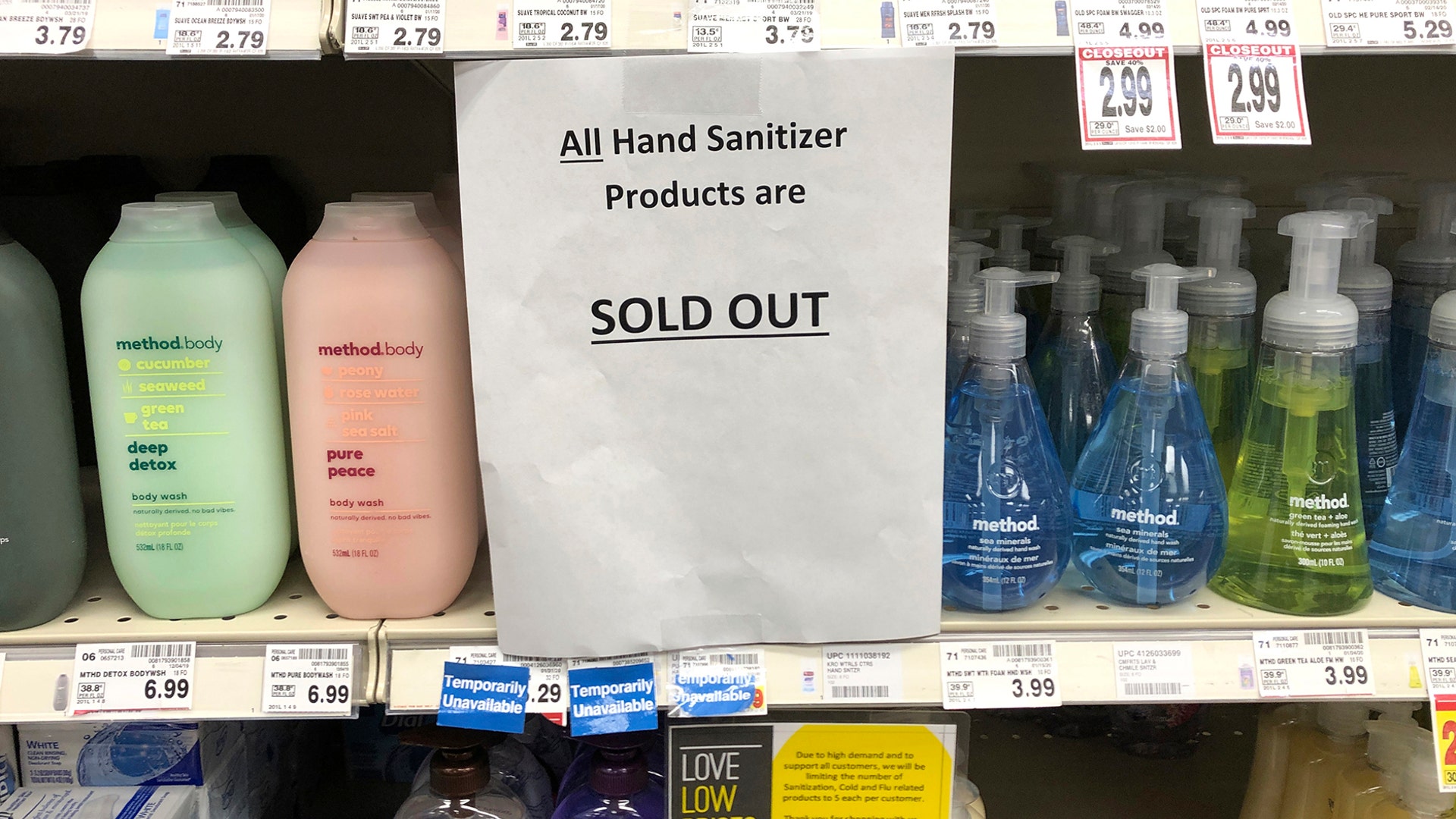 A sign on a shelf at a QFC grocery store advises shoppers that all hand sanitizer products are sold out in Kirkland, Wash., Mar. 3, 2020.