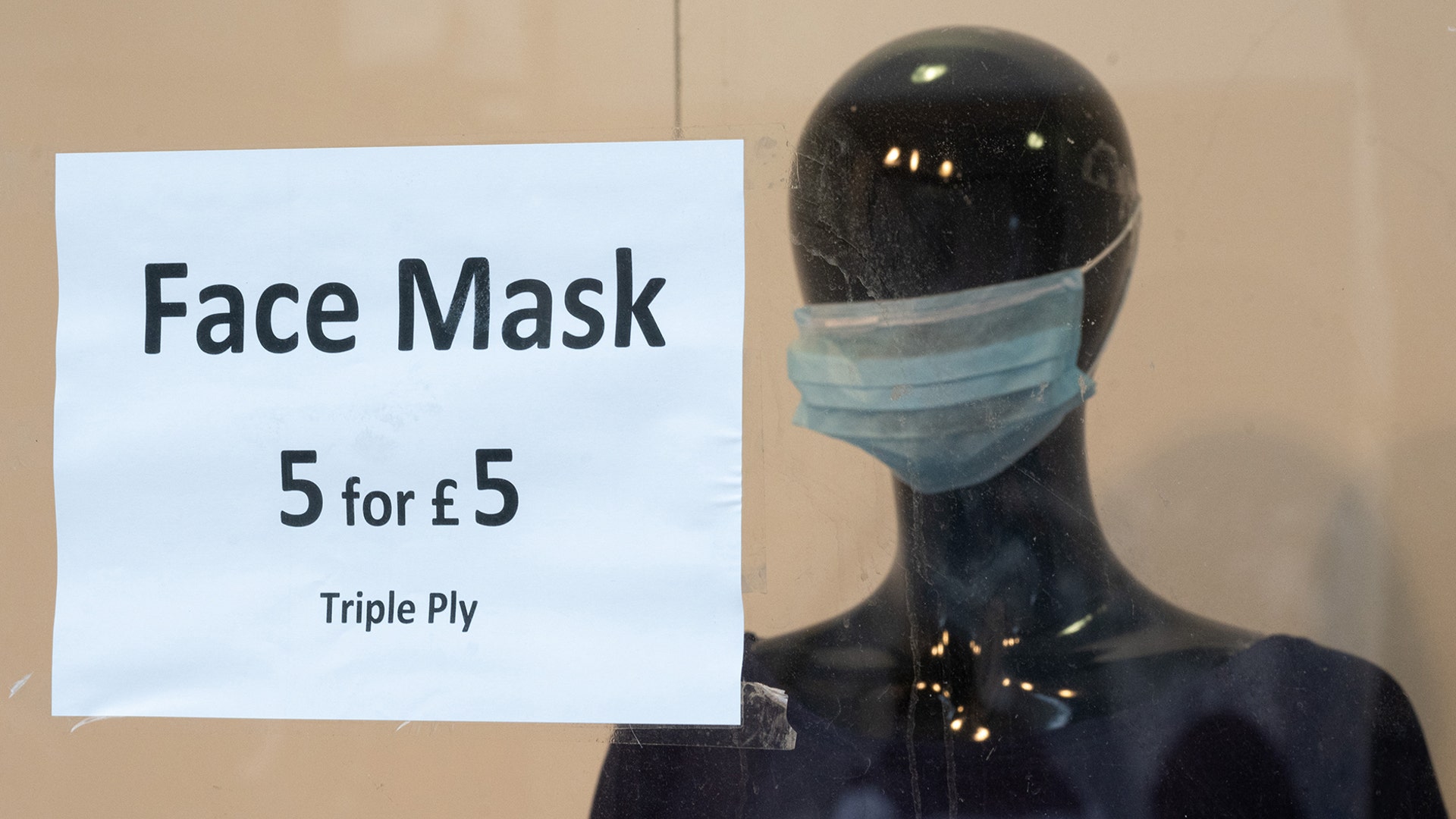 Surgical face masks for sale at a clothes store in Cardiff, United Kingdom, Mar. 7, 2020. 