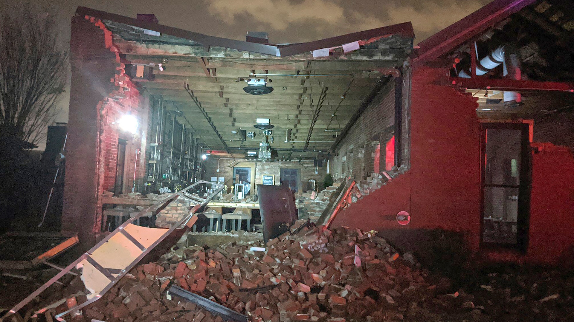 Bricks from a collapsed wall at the Geist restaurant litter the ground after a tornado touched down in downtown Nashville on Tuesday, March 3, 2020.