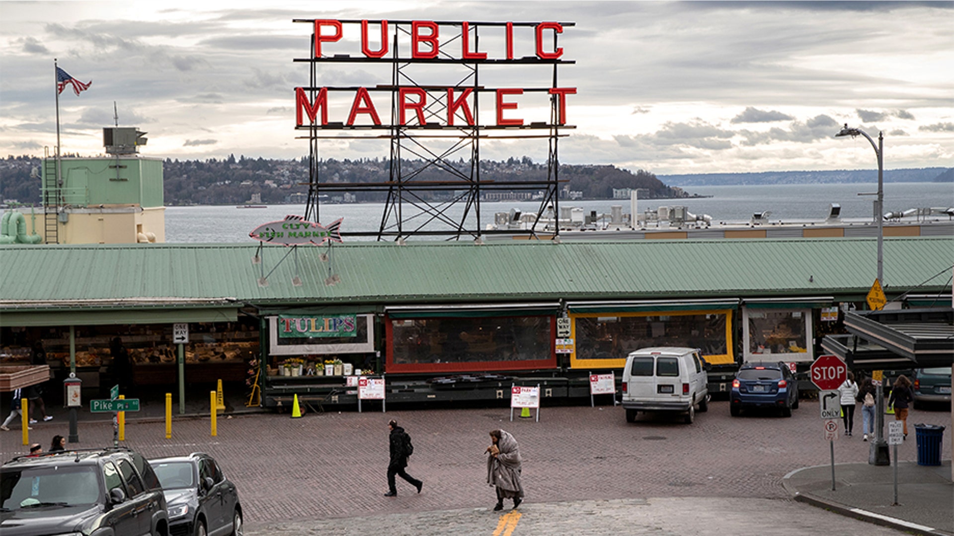 Seattle, Washington: The Pike Place Market standing virtually empty of patrons. The historic farmer's market is Seattle's most popular tourist attraction, and business has been especially hard hit by coronavirus fears.