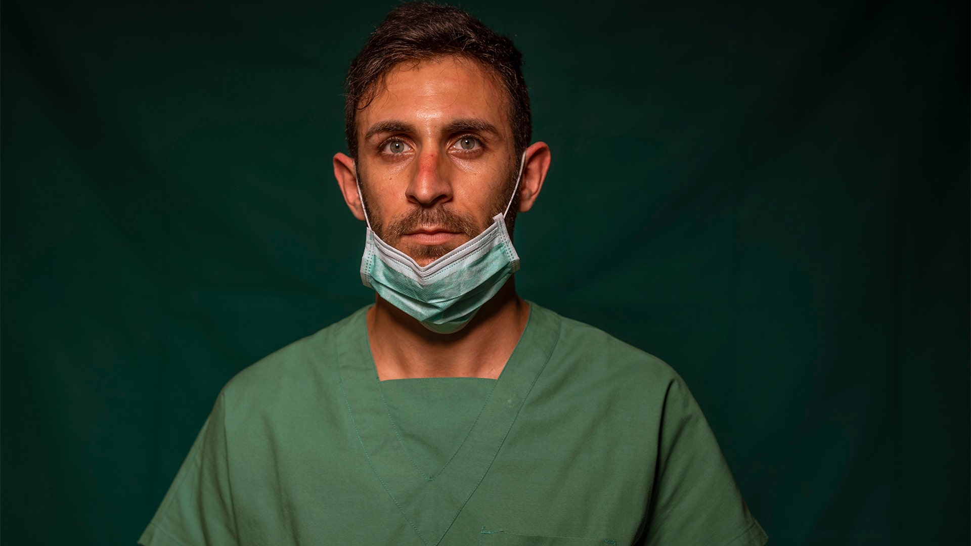 Daniele Rondinella, 30, an ICU nurse at Rome's COVID 3 Spoke Casalpalocco Clinic, poses for a portrait during a break in his daily shift in Rome, Italy, March 27, 2020.