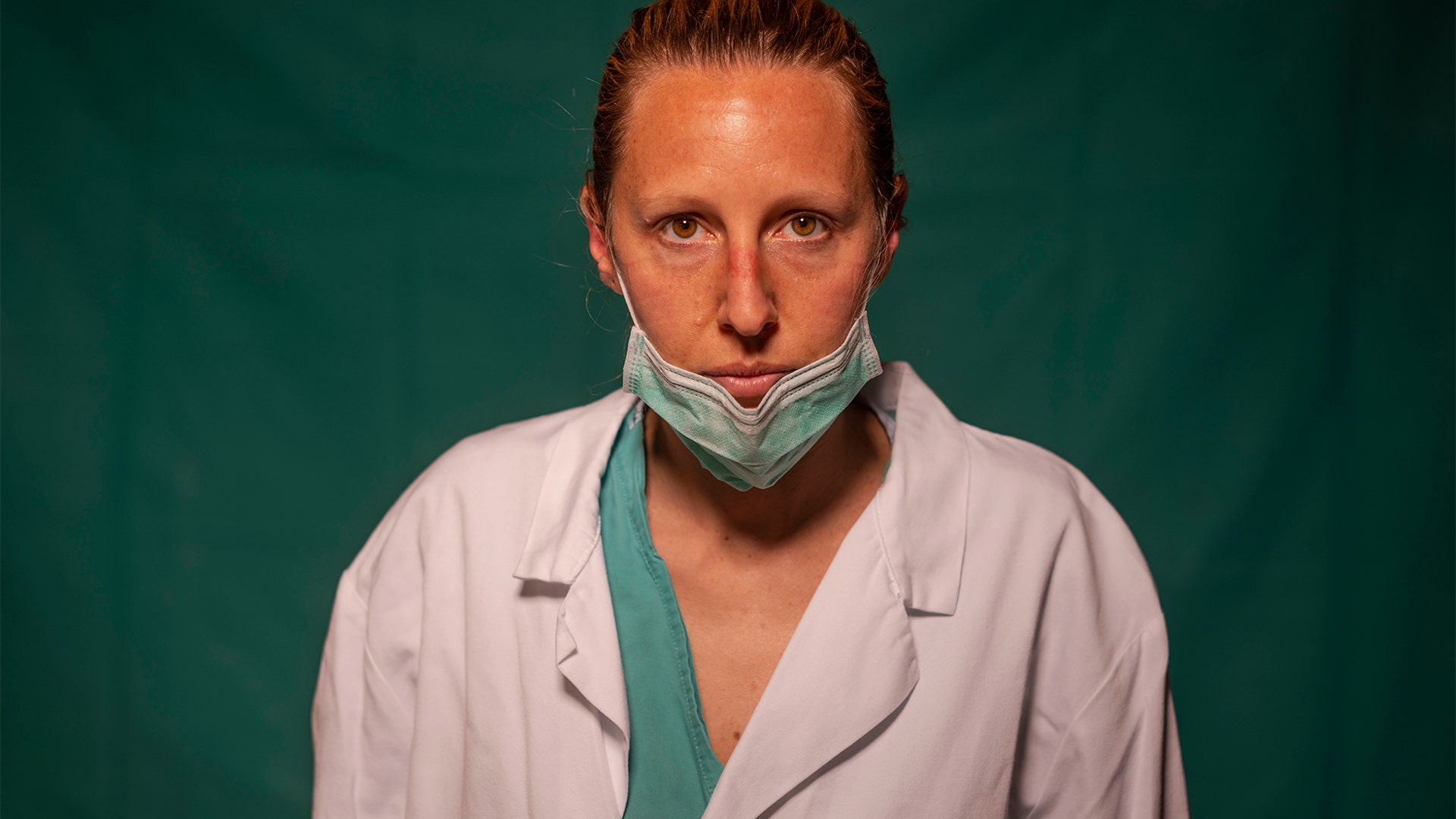 Doctor Marta Catoni, 33, an immunologist at Rome's COVID 3 Spoke Casalpalocco Clinic, poses for a portrait during a break in her daily shift in Rome, Italy, March 27, 2020.