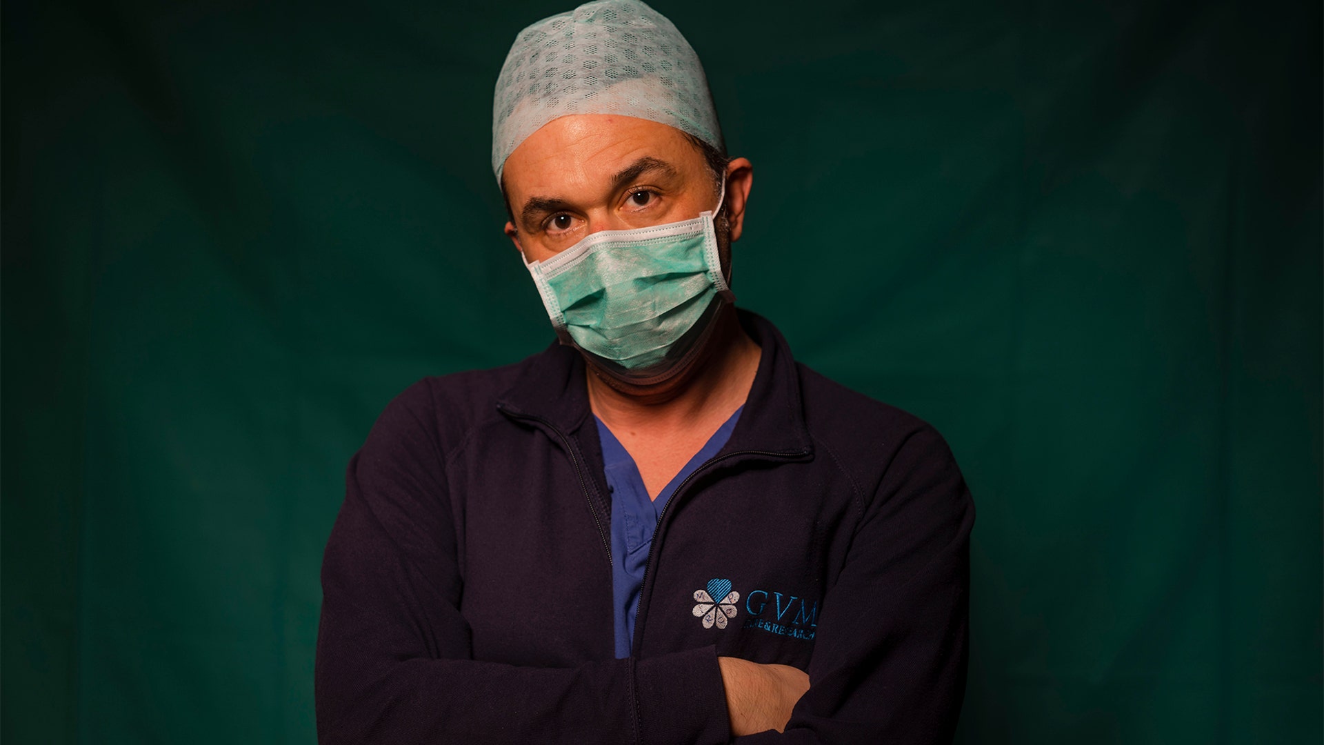 Mirko Perruzza, 43, a nurse at Rome's COVID 3 Spoke Casalpalocco Clinic, poses for a portrait during a break in his daily shift in Rome, Italy, March 27, 2020.