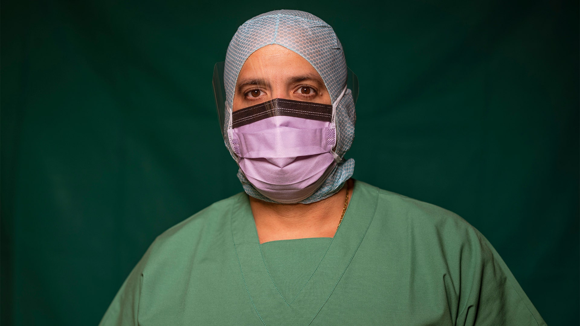 Adriano Rodriguez, 48, an ICU nurse at Rome's COVID 3 Spoke Casalpalocco Clinic, poses for a portrait during a break in his daily shift, in Rome, Italy, March 27, 2020.