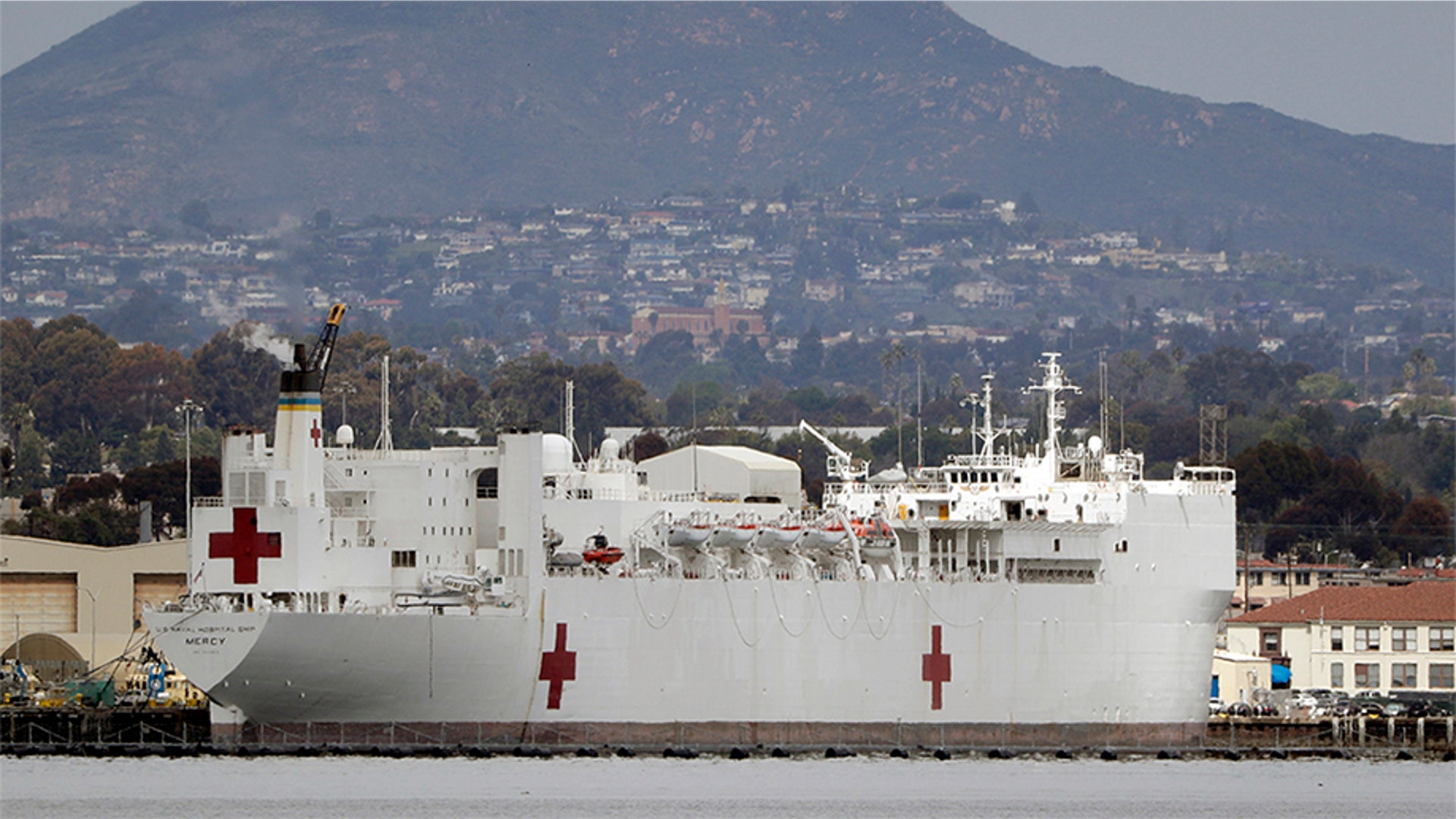 The USNS Mercy, a Navy hospital ship, is seen docked at Naval Base San Diego in San Diego, Calif., March 18, 2020.