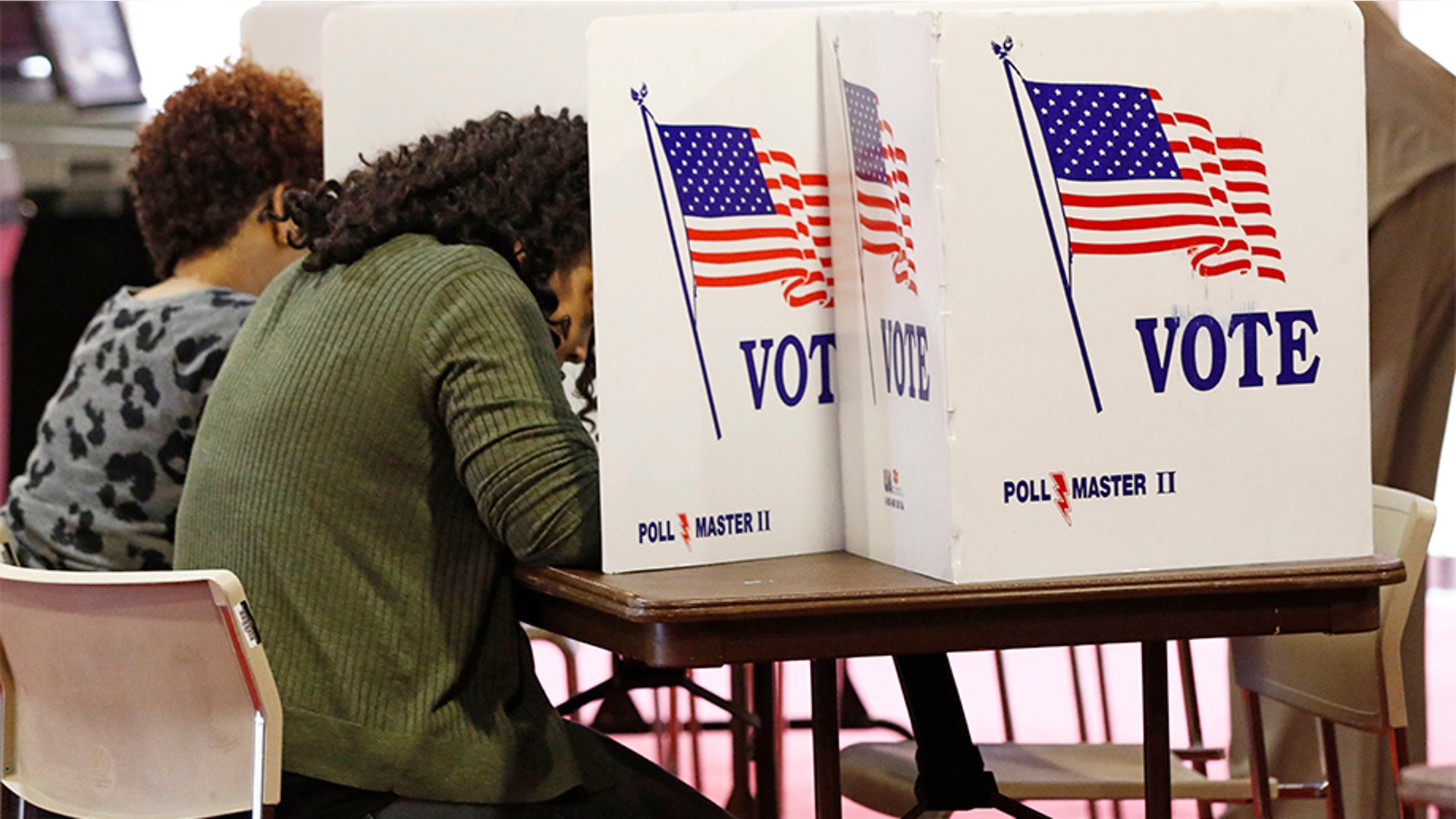 Voters working on their ballots in the kiosks in Jackson, Mississippi.
