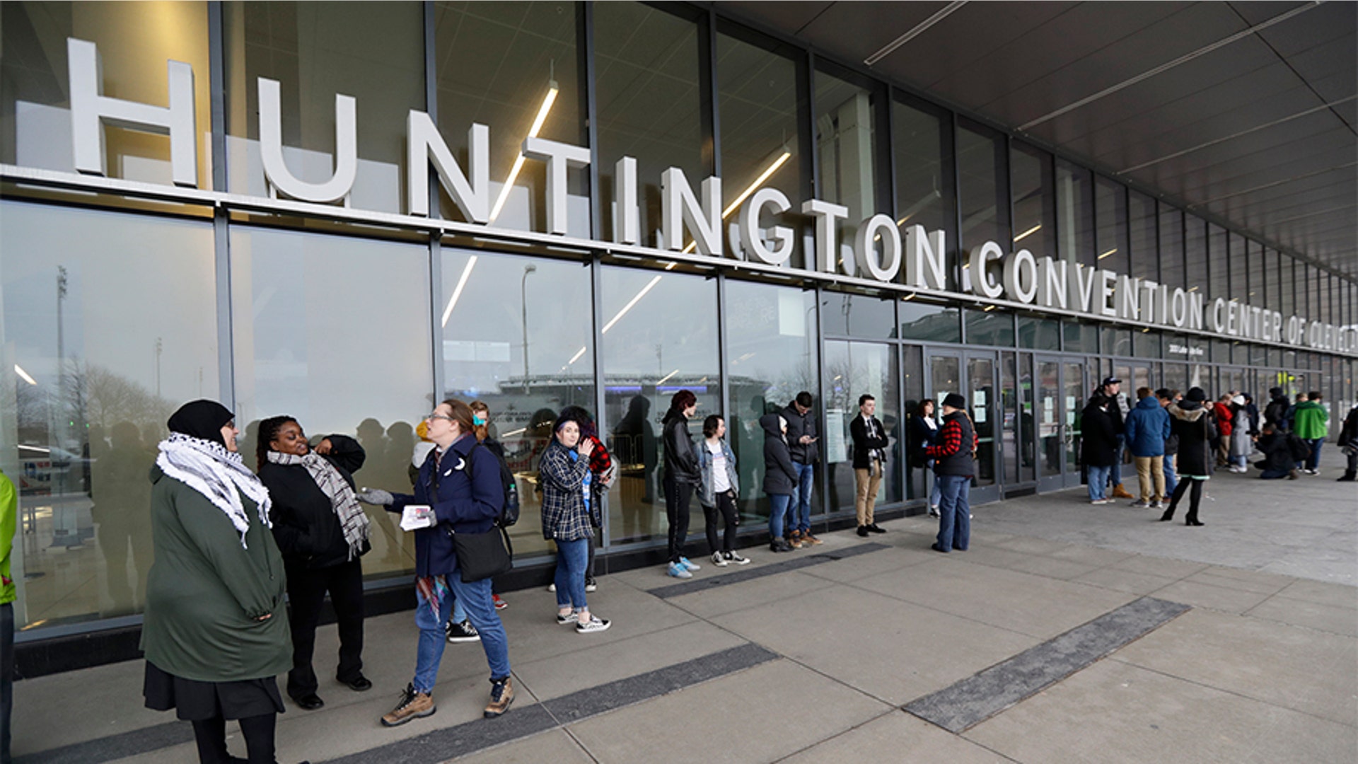 Supporters of presidential candidate Sen. Bernie Sanders, I-Vt., waiting outside before a campaign rally, in Cleveland. The rally was canceled due to concerns about coronavirus.