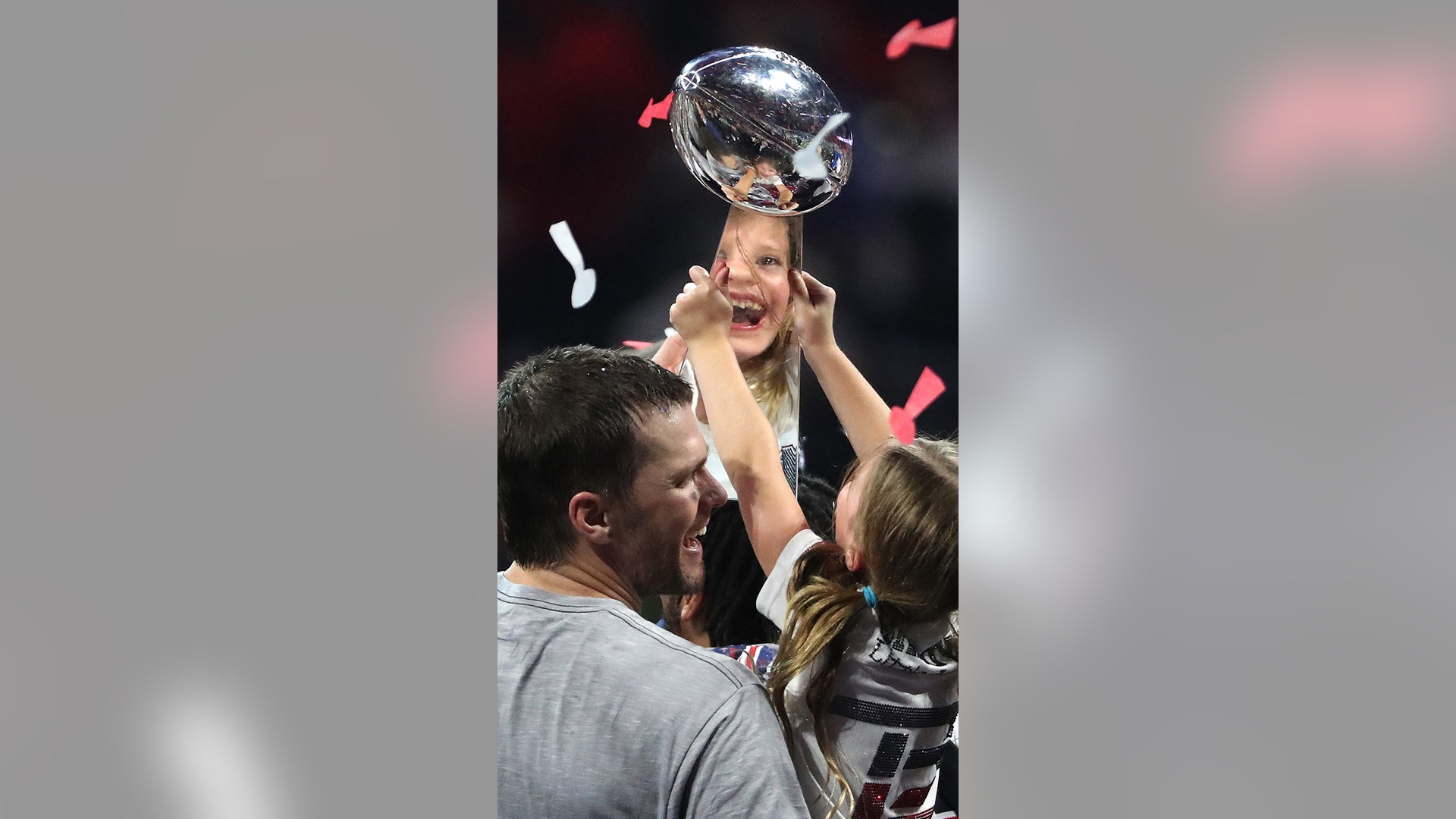 Tom Brady and his daughter Vivian Lake Brady celebrate with the Vince Lombardi trophy on Feb. 3, 2019 in Atlanta, Ga.