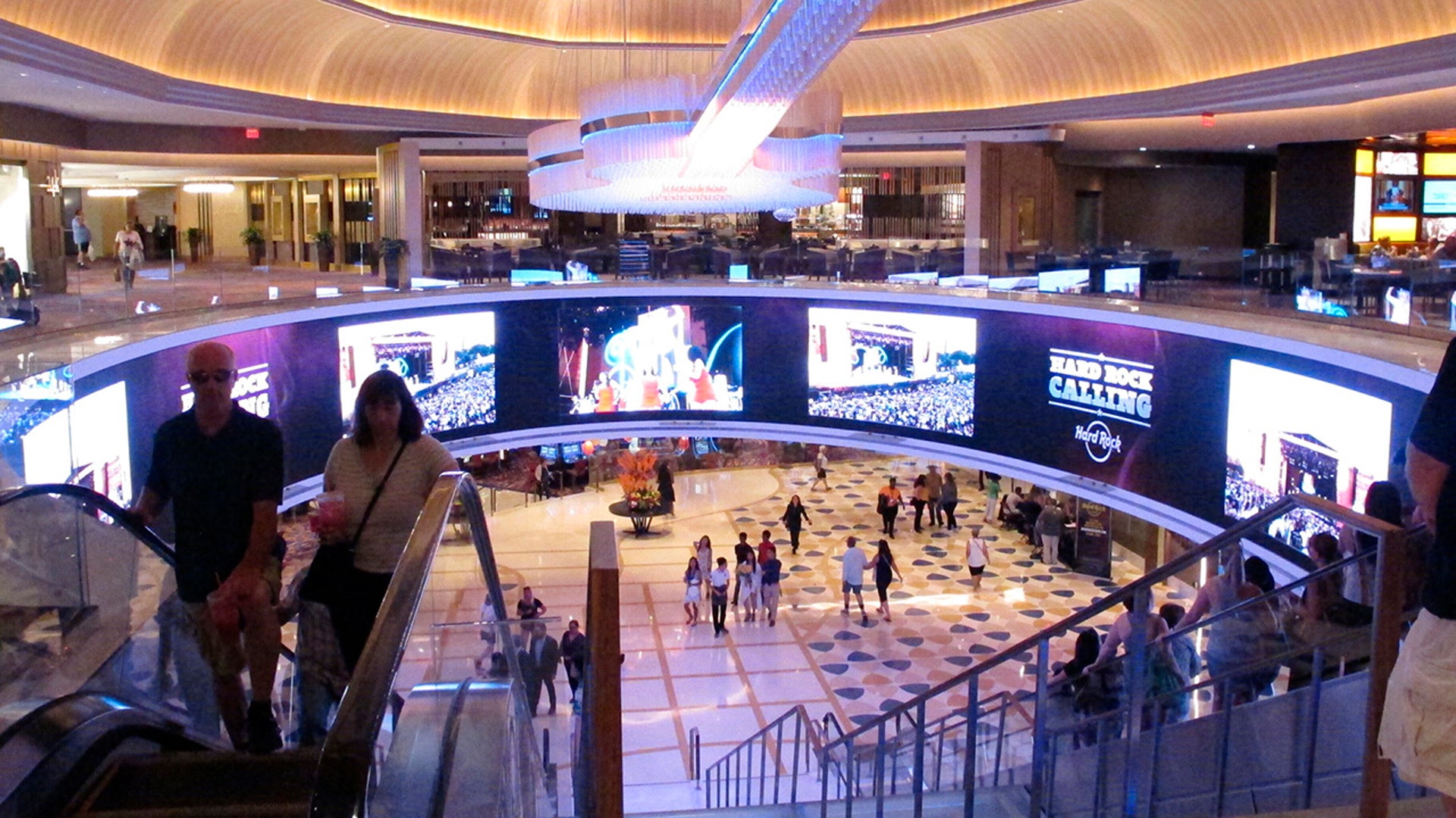 FILE - This June 20, 2019 file photo shows the lobby of the Hard Rock casino in Atlantic City, N.J. On Friday, March 13, 2020, Hard Rock announced it is canceling live entertainment at all its U.S. properties for 30 days in response to the coronavirus outbreak, one of many steps casinos around the country are taking in response to the outbreak.