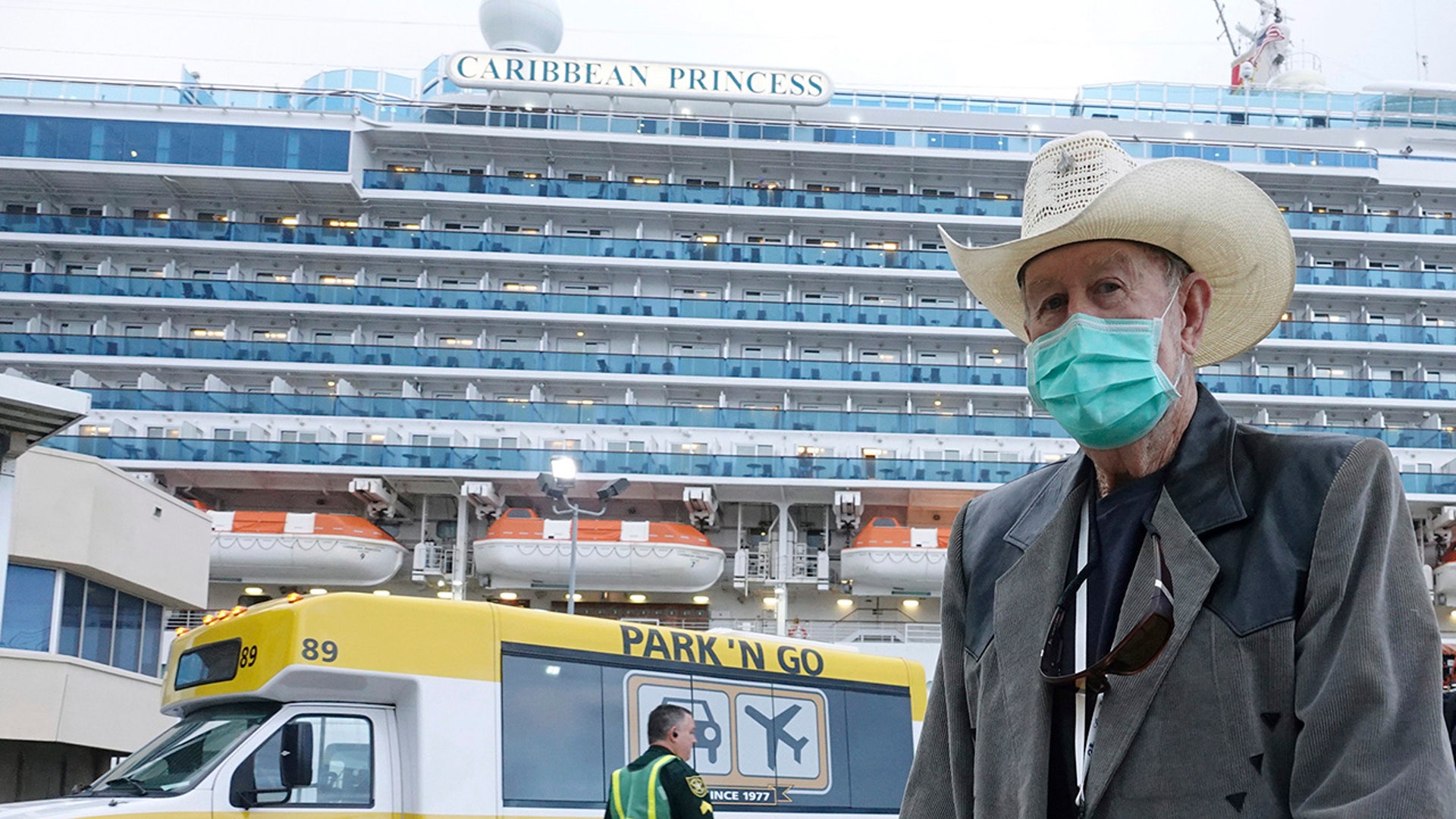 Ronny Young, of Port St. Joe, Florida, disembarks from the Caribbean Princess at Port Everglades in Fort Lauderdale, Fla. Wednesday, March 11, 2020. The cruise ship was given federal permission to dock in Florida after testing of two crew members cleared them of the new coronavirus and U.S. health officials lifted a “no sail" order.