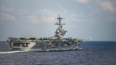 US aircraft carriers train in South China Sea amid tensions early in Biden administration