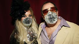 Partygoers bedazzling face masks amid coronavirus outbreak