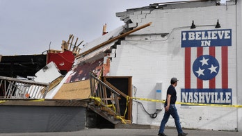 Pictures: People sift through tornado-damaged homes in Tennessee