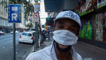 South Africa goes on 21-day lockdown as coronavirus cases surge