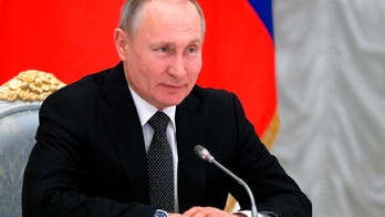Russia's Vladimir Putin proposes constitutional amendments mentioning God, traditional marriage
